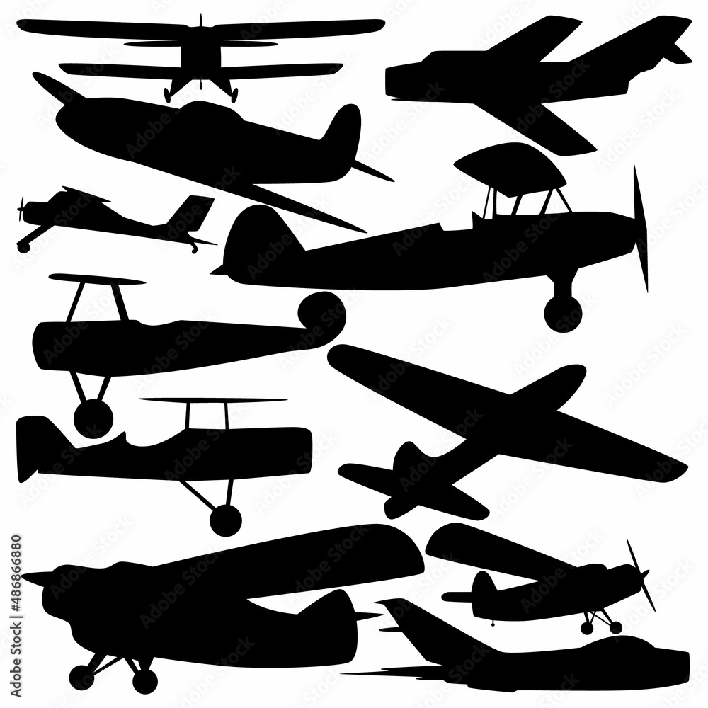 Wall mural a set of silhouettes of old planes.