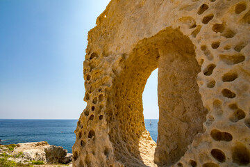 Natural arch. Sunny summer day, beautiful scenery views by the sea. Santa Maria di Leuca, region of...