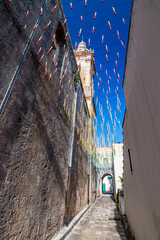 Holiday decorations. Montesano Salentino, region of Lecce, Italy. Lovely summer day. Travel street...