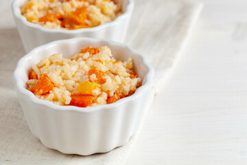 Porridge with pumpkin and pumpkin seed, healthy food concept, close-up