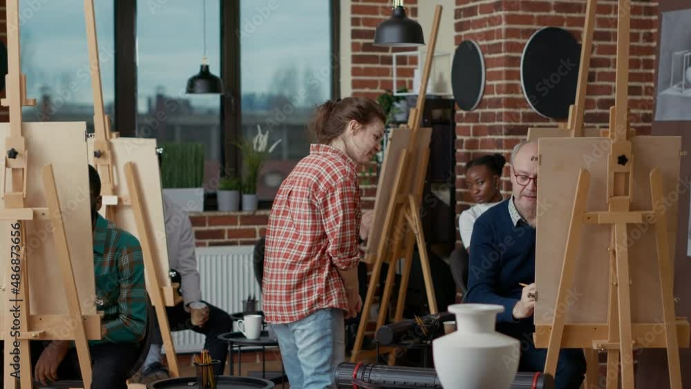 Poster art lesson teacher supervising students drawing vase model on canvas, using pencil, canvas and artis