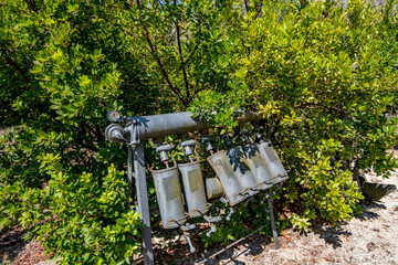 Gerdining equipment. Sunny summer day view from the botanical garden called Giardino Botanico La Cutura S.r.l., Contrada Cutura, Giuggianello LE, region of Lecce, Italy