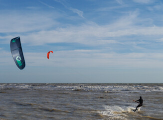 kite surfing in the sea.
