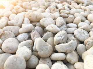 Beautiful natural white rocks with bright orange sunlight for cover backgrounds or other design illustrations and artwork.