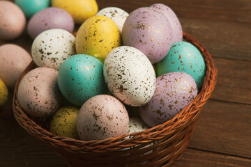 Hand painted pastel colored Easter eggs background. Happy Easter greeting card or invitation.