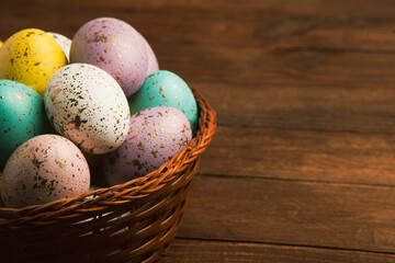 Hand painted pastel colored Easter eggs background. Happy Easter greeting card or invitation.