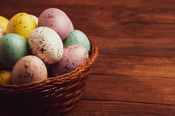 Hand painted pastel colored Easter eggs background. Happy Easter greeting card or invitation.