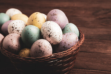 Hand painted pastel colored Easter eggs background. Happy Easter greeting card or invitation.