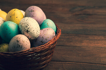 Hand painted pastel colored Easter eggs background. Happy Easter greeting card or invitation.