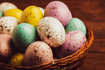 Hand painted pastel colored Easter eggs background. Happy Easter greeting card or invitation.