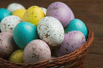 Hand painted pastel colored Easter eggs background. Happy Easter greeting card or invitation.