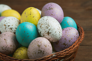 Hand painted pastel colored Easter eggs background. Happy Easter greeting card or invitation.