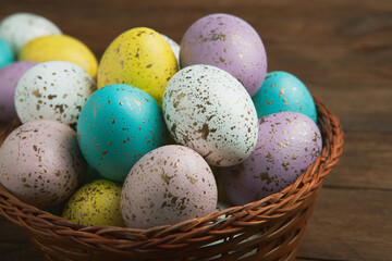 Hand painted pastel colored Easter eggs background. Happy Easter greeting card or invitation.