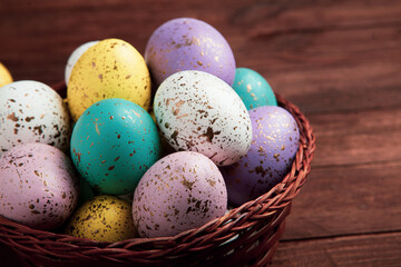 Hand painted pastel colored Easter eggs background. Happy Easter greeting card or invitation.