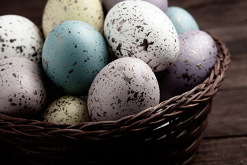 Hand painted pastel colored Easter eggs background. Happy Easter greeting card or invitation.