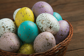 Hand painted pastel colored Easter eggs background. Happy Easter greeting card or invitation.