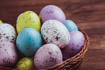 Hand painted pastel colored Easter eggs background. Happy Easter greeting card or invitation.