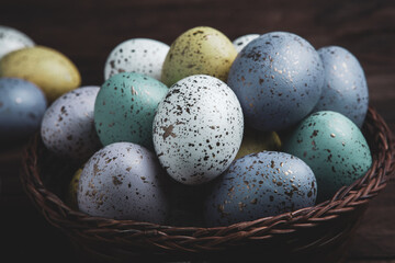 Hand painted pastel colored Easter eggs background. Happy Easter greeting card or invitation.