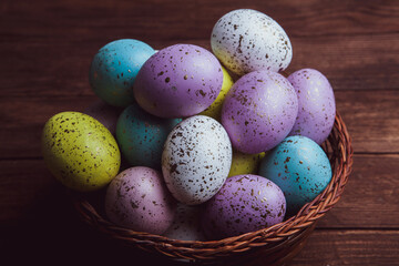 Hand painted pastel colored Easter eggs background. Happy Easter greeting card or invitation.