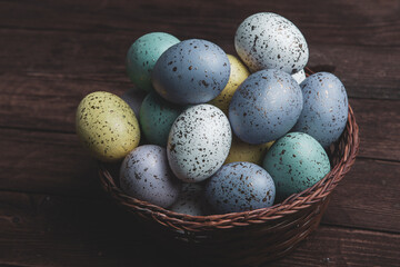 Hand painted pastel colored Easter eggs background. Happy Easter greeting card or invitation.