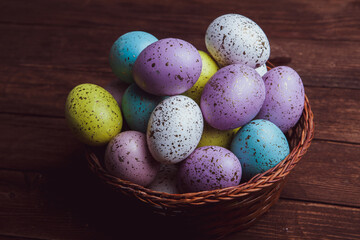 Hand painted pastel colored Easter eggs background. Happy Easter greeting card or invitation.