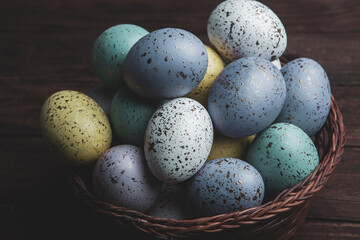 Hand painted pastel colored Easter eggs background. Happy Easter greeting card or invitation.