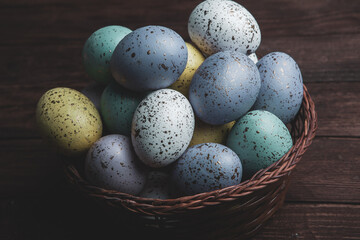 Hand painted pastel colored Easter eggs background. Happy Easter greeting card or invitation.