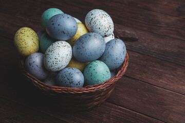 Hand painted pastel colored Easter eggs background. Happy Easter greeting card or invitation.