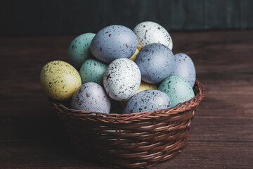 Hand painted pastel colored Easter eggs background. Happy Easter greeting card or invitation.