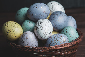 Hand painted pastel colored Easter eggs background. Happy Easter greeting card or invitation.