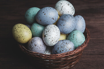 Hand painted pastel colored Easter eggs background. Happy Easter greeting card or invitation.