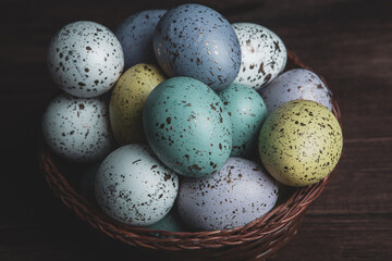 Hand painted pastel colored Easter eggs background. Happy Easter greeting card or invitation.