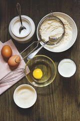 Dough for cooking pancakes on kefir. Eggs, flour, a glass of kefir, sugar, salt. Country style.