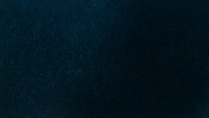 Dark blue abstract  background with textured effect. 