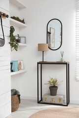 Hallway interior with console table and stylish decor
