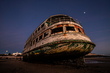 ship wreck after sunset, Setubal, Portugal