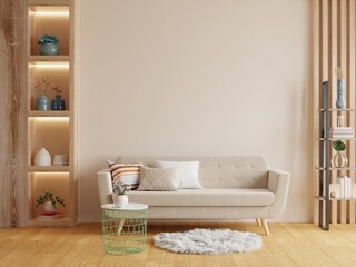 Mockup living room interior with sofa on empty cream color wall background.
