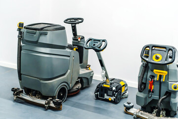 Industrial equipment for washing floors in large rooms. Parking of equipment in the household...