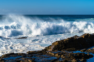Waves Crashing on Rocks