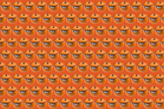 Orange abstract background composed of pumpkins with sunglasses