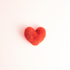 Shaggy red heart isolated on white background. Feelings, love and emotions concept. Flat lay.