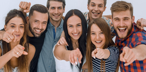 creative business team pointing at you