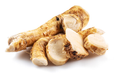 Horseradish roots close up isolated on white background.