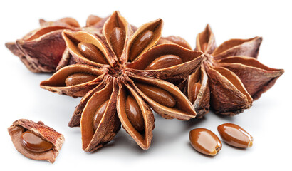 Anise star and aniseeds, spice with strong taste used in cooking, isolated on white background.