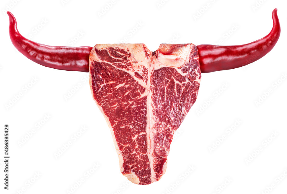 Wall mural T-bone beef steak and hot peppers arranged in a shape of bull head. Conceptual food picture. File contains clipping path.