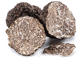 Black winter truffles and truffle slices on white background. The most famous of the trufflez.