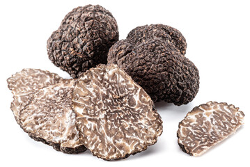 Black winter truffles and truffle slices on white background. The most famous of the trufflez.