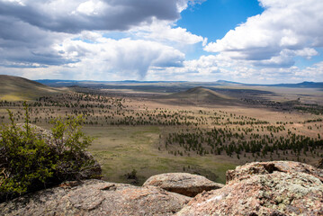 view of the valley from mountain peaks in cloudy weather