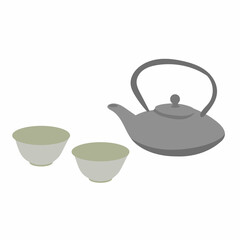 grey teapot and a couple of cups of tea rest