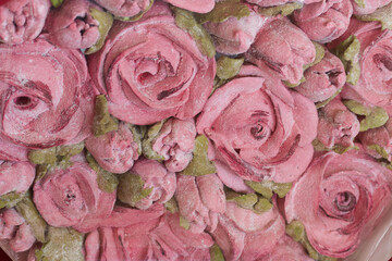 A bouquet of marshmallows. Zephyr flowers. Packed in craft paper. Close-up.
